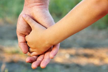 Holding a father's hand